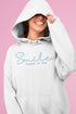 Introducing the latest in wearable cheer technology: the "Smile, Pass It On" Hoodie! This isn't just any ordinary hoodie. Oh no, it's your new best friend, fashion statement, and personal cheerleader all rolled into one cozy package.