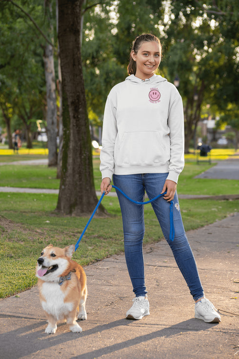 Introducing the latest must-have in your wardrobe that's guaranteed to turn frowns upside down: the Happy Face Hoodie emblazoned with the cheer-spreading command, "Smile...Pass it on." This isn't just any ordinary hoodie; it's your ticket to becoming a walking, talking (and very cozy) ambassador of joy!