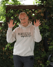 Introducing our latest addition to the collection - the gender-neutral hoodie with the inspiring message "Perfectly Imperfect". Made from high-quality materials, this sweater is designed to be both comfortable and durable. 