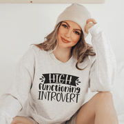 Introducing the ultimate sweatshirt for all you introverts and homebodies out there - the High Functioning Introvert sweatshirt! This gender-neutral top is the perfect addition to your wardrobe, whether you're lounging at home or out in the world pretending to be a functioning member of society. Made with the softest material, this sweatshirt will keep you cozy and comfortable as you curl up with a good book or binge-watch your favorite show. 