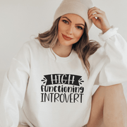 Introducing the ultimate sweatshirt for all you introverts and homebodies out there - the High Functioning Introvert sweatshirt! This gender-neutral top is the perfect addition to your wardrobe, whether you're lounging at home or out in the world pretending to be a functioning member of society. Made with the softest material, this sweatshirt will keep you cozy and comfortable as you curl up with a good book or binge-watch your favorite show. 