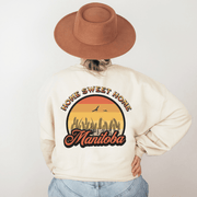 Introducing the perfect addition to your wardrobe for those chilly Canadian nights - our gender neutral Manitoba Home Sweet Home Sweatshirt! Designed with a stunning Prairie sunset on the back, complete with wheat and the phrase "Home Sweet Home Manitoba," this sweater is not only stylish but also serves as a nod to your love for the beautiful Canadian nature. 