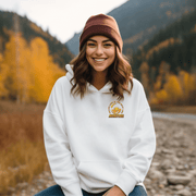 This gender neutral hoodie features a stunning graphic of a farmer's field with golden wheat and a breathtaking prairie sunset. The saying "Prairie Life Is The Best Life-Manitoba" is proudly displayed, representing the love and appreciation for the simple yet fulfilling life in this wonderful province. 