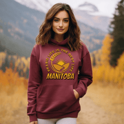 Harvest Hoodie with a beautiful graphic of a farmer's field, wheat, and a prairie sunset with the phrase Prairie Life Is The Best Life perfectly captures the essence of living in Manitoba.
