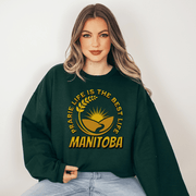 This cozy sweatshirt features a stunning graphic of a farmer's field with golden wheat and a beautiful prairie sunset. As an ode to the gorgeous Canadian province of Manitoba, this sweatshirt displays the saying "Prairie Life Is The Best Life-Manitoba."