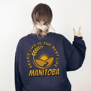 This Canada Sweater features a beautiful farmers field graphic with wheat and a prairie sunset, as well as the saying "Prairie Life Is The Best Life-Manitoba".