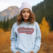 Our trendy gender-neutral hoodie features a retro graphic with the words “Winnipeg” in rainbow colors! This custom hoodie is a must-have for anyone looking to show off their Canadian pride and love for the city of Winnipeg.