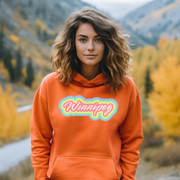 Introducing the perfect addition to your wardrobe - our trendy gender-neutral hoodie with a retro graphic and the rainbow-colored word "Winnipeg" emblazoned across the front.