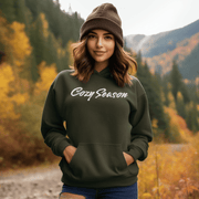 With the Cozy Season upon us, it's time to upgrade your wardrobe with this must-have hoodie. Whether you're going apple picking, jumping in leaf piles, or just lounging on the couch, our Fall Hoodie has got you covered. Literally. 
