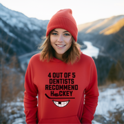 Introducing the ultimate graphic hoodie for all the hockey fans out there - the 4 Out Of 5 Dentists Recommend Hockey hoodie! This gender-neutral hoodie is perfect to wear during hockey season and will surely make you stand out from the crowd. Featuring a quirky design of a smiling mouth with a missing tooth, this hoodie is sure to bring a smile to everyone's face. 