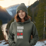Introducing the ultimate hockey hoodie for anyone who wants to bring their EH game to the rink! Whether you're a seasoned veteran or a newbie to the sport, this funny hockey hoodie is the perfect addition to your wardrobe. Made from soft and comfortable material, this hockey hoodie is perfect for keeping you warm during those chilly games. And with the hilarious "Bring Your EH Game" slogan emblazoned across the front, you'll be sure to get a few chuckles from your teammates.