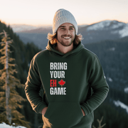 Introducing the ultimate hockey hoodie for anyone who wants to bring their EH game to the rink! Whether you're a seasoned veteran or a newbie to the sport, this funny hockey hoodie is the perfect addition to your wardrobe. Made from soft and comfortable material, this hockey hoodie is perfect for keeping you warm during those chilly games. And with the hilarious "Bring Your EH Game" slogan emblazoned across the front, you'll be sure to get a few chuckles from your teammates. 