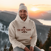 Introducing the ultimate hockey hoodie for all the true hockey fans out there - The EH Team Hoodie! This gender-neutral hoodie is the perfect addition to any hockey player's wardrobe. Whether you're skating on the ice or cheering from the stands, this hoodie will keep you warm and stylish. But let's be real, the best part of this hoodie is the hilarious pun. The EH Team? More like the A+ pun team! You'll have everyone cracking up at the rink with this funny hockey hoodie. 