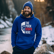 The Puck Stops Here! This hoodie is the perfect addition to any hockey player's wardrobe, or for those who just love a good laugh. With a goalie mask graphic on the front and the hilarious pun, "The Puck Stops Here", you'll feel like a true Canadian hockey superstar. 