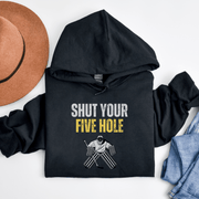 Introducing the ultimate hockey hoodie for all those sassy goalies out there - the Shut Your Five Hole hoodie! Made from only the finest materials (and a little bit of goalie magic), this gender-neutral hoodie is perfect for anyone looking to up their hockey game while still looking stylish. Featuring a bold graphic of a goalie with the hilarious phrase "Shut Your Five Hole" emblazoned across the front, this hoodie is sure to turn heads (and make opponents laugh). 