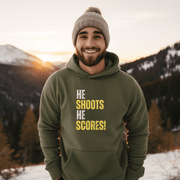 Attention all hockey players and fans! Are you looking for a gender-neutral hoodie that perfectly captures the Canadian spirit of hockey? Look no further than our "He Shoots He Scores" hockey hoodie! This funny hockey hoodie is the perfect gift for any hockey player who wants to show off their love for the game while keeping warm and looking stylish. 
