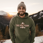 Looking for a hilarious way to show your love for Canadian hockey? Look no further than The EH Team hockey hoodie! This gender neutral hoodie is perfect for all hockey players, fans, and anyone who loves a good puck joke. Made from the comfiest material this side of the border, The EH Team hoodie will keep you warm and cozy on even the chilliest of rinks. And with its witty play on words, you'll be the envy of all your hockey buddies. 