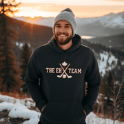 Looking for a hilarious way to show your love for Canadian hockey? Look no further than The EH Team hockey hoodie! This gender neutral hoodie is perfect for all hockey players, fans, and anyone who loves a good puck joke. Made from the comfiest material this side of the border, The EH Team hoodie will keep you warm and cozy on even the chilliest of rinks. And with its witty play on words, you'll be the envy of all your hockey buddies. 