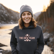 Looking for a hilarious way to show your love for Canadian hockey? Look no further than The EH Team hockey hoodie! This gender neutral hoodie is perfect for all hockey players, fans, and anyone who loves a good puck joke. Made from the comfiest material this side of the border, The EH Team hoodie will keep you warm and cozy on even the chilliest of rinks. And with its witty play on words, you'll be the envy of all your hockey buddies.