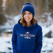 Looking for a hilarious way to show your love for Canadian hockey? Look no further than The EH Team hockey hoodie! This gender neutral hoodie is perfect for all hockey players, fans, and anyone who loves a good puck joke. Made from the comfiest material this side of the border, The EH Team hoodie will keep you warm and cozy on even the chilliest of rinks. And with its witty play on words, you'll be the envy of all your hockey buddies.