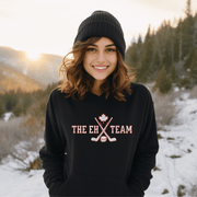 Looking for a hilarious way to show your love for Canadian hockey? Look no further than The EH Team hockey hoodie! This gender neutral hoodie is perfect for all hockey players, fans, and anyone who loves a good puck joke. Made from the comfiest material this side of the border, The EH Team hoodie will keep you warm and cozy on even the chilliest of rinks. And with its witty play on words, you'll be the envy of all your hockey buddies. 