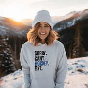 Introducing the must-have hoodie for any hockey player, fan, or enthusiast: the Sorry. Can't. Hockey. Bye. hoodie! Perfect for those chilly days at the rink or just lounging at home, this gender-neutral hoodie is sure to make everyone laugh.