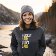 Introducing the perfect accessory for any hockey player or fan - our hilarious gender neutral hockey hoodie! This hoodie is not only stylish but also practical, with a cozy design that is perfect for keeping you warm during those chilly hockey games. Featuring the witty slogan "Hockey Hair Don’t Care", this funny hockey hoodie is the perfect way to show off your love for the game and your luscious locks