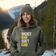 Introducing the perfect accessory for any hockey player or fan - our hilarious gender neutral hockey hoodie! This hoodie is not only stylish but also practical, with a cozy design that is perfect for keeping you warm during those chilly hockey games. Featuring the witty slogan "Hockey Hair Don’t Care", this funny hockey hoodie is the perfect way to show off your love for the game and your luscious locks
