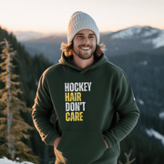 Introducing the perfect accessory for any hockey player or fan - our hilarious gender neutral hockey hoodie! This hoodie is not only stylish but also practical, with a cozy design that is perfect for keeping you warm during those chilly hockey games. Featuring the witty slogan "Hockey Hair Don’t Care", this funny hockey hoodie is the perfect way to show off your love for the game and your luscious locks.
