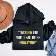 Introducing the perfect gift for any hockey player or fan: the "I'm Sorry For What I Said In The Penalty Box" hoodie! This gender-neutral, cozy hoodie is made for those who are passionate about Canadian hockey, but also have a sense of humor about their on-ice behavior. 