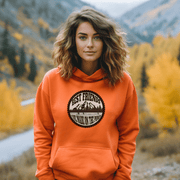 This gender-neutral hoodie is perfect for anyone who loves hockey and is proud to show it. With a graphic featuring people playing pond hockey with a stunning mountain background, this hoodie is sure to turn heads and start conversations. 