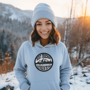This gender-neutral hoodie is perfect for anyone who loves hockey and is proud to show it. With a graphic featuring people playing pond hockey with a stunning mountain background, this hoodie is sure to turn heads and start conversations. But this hoodie isn't just a fashion statement. It's also designed for comfort and durability. 