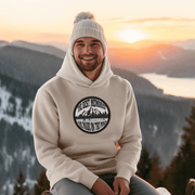 This gender-neutral hoodie is designed especially for those who love the game and want to show off their passion for it. With a graphic featuring people playing pond hockey with a beautiful mountain background, this hoodie is perfect for those who enjoy outdoor hockey in the Canadian winter. 