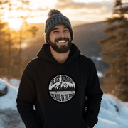 This gender-neutral hoodie is designed especially for those who love the game and want to show off their passion for it. With a graphic featuring people playing pond hockey with a beautiful mountain background, this hoodie is perfect for those who enjoy outdoor hockey in the Canadian winter. 