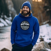 This gender-neutral hoodie is designed especially for those who love the game and want to show off their passion for it. With a graphic featuring people playing pond hockey with a beautiful mountain background, this hoodie is perfect for those who enjoy outdoor hockey in the Canadian winter.