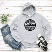 This gender-neutral hoodie is designed especially for those who love the game and want to show off their passion for it. With a graphic featuring people playing pond hockey with a beautiful mountain background, this hoodie is perfect for those who enjoy outdoor hockey in the Canadian winter.
