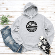 This gender-neutral hoodie is perfect for anyone who loves hockey and is proud to show it. With a graphic featuring people playing pond hockey with a stunning mountain background, this hoodie is sure to turn heads and start conversations.