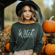 This gender neutral sweatshirt is sure to make you the talk of the town. The "Witch Please" message emblazoned on the front, accompanied by a witches broom, is perfect for those who want to show off their witchy side in style.