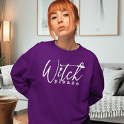 This gender neutral sweatshirt is sure to make you the talk of the town. The "Witch Please" message emblazoned on the front, accompanied by a witches broom, is perfect for those who want to show off their witchy side in style.