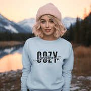 This sweatshirt is perfect for anyone who enjoys snuggling up with a hot chocolate, a cozy sweater, and a good book on a chilly autumn day. With its soft and warm material, you'll want to wear this sweatshirt all season long. 