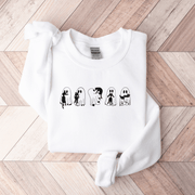  This gender-neutral sweatshirt is perfect for the upcoming Spooky Season, featuring adorable ghosts holding black cats. It's the perfect way to show off your love for Halloween, ghosts, and cats all at once.