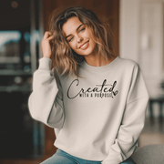 This sweatshirt was created with a purpose - to spread the message of self-love and motivation. Perfect for those days when you need a little extra boost, this cozy sweatshirt will remind you that you are created with a purpose and that purpose is to love yourself! 