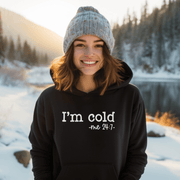 Introducing the gender-neutral hoodie that will make you the envy of all your friends - the "I'm Cold-Me 24:7"! This hoodie is perfect for anyone who is always feeling chilly, no matter what time of day it is