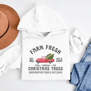 Introducing the perfect hoodie for the holiday season: our gender-neutral, ultra-cozy hoodie featuring a vintage farm truck loaded up with fresh Christmas trees