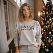 Introducing the ultimate holiday sweatshirt that combines two of your favorite things: adorable Christmas gnomes and the iconic TV show Friends! 