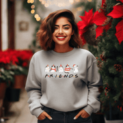 Introducing the ultimate holiday season staple: the gender-neutral sweatshirt featuring adorable Christmas Cartoon Cats and the iconic "FRIENDS" logo from the beloved TV show! 