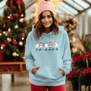 Introducing the ultimate holiday season staple: the gender-neutral hoodie featuring adorable Christmas Cartoon Cats and the iconic "FRIENDS" logo from the beloved TV show! 