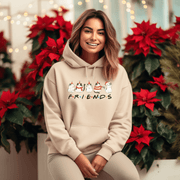 Introducing the ultimate holiday season staple: the gender-neutral hoodie featuring adorable Christmas Cartoon Cats and the iconic "FRIENDS" logo from the beloved TV show! 