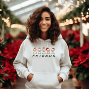 Introducing the perfect hoodie for the holiday season - our gender neutral hoodie featuring cute Christmas cartoon dogs and the iconic word "FRIENDS" from the hit TV show! 