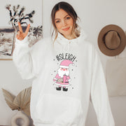This gender neutral hoodie features a cute Santa holding a Stanley water bottle and sporting a trendy belt bag with the hashtag #SLEIGH. But wait, there's more! This hoodie is not just soft and comfortable, it's also magically warm - perfect for those cold winter nights. 